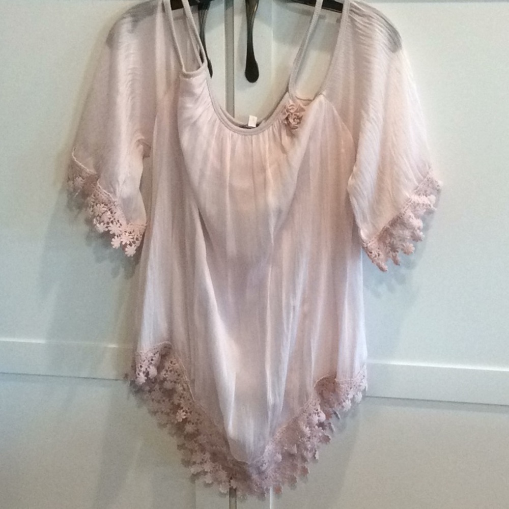 NWOT.  Boutique brand lace edged top.